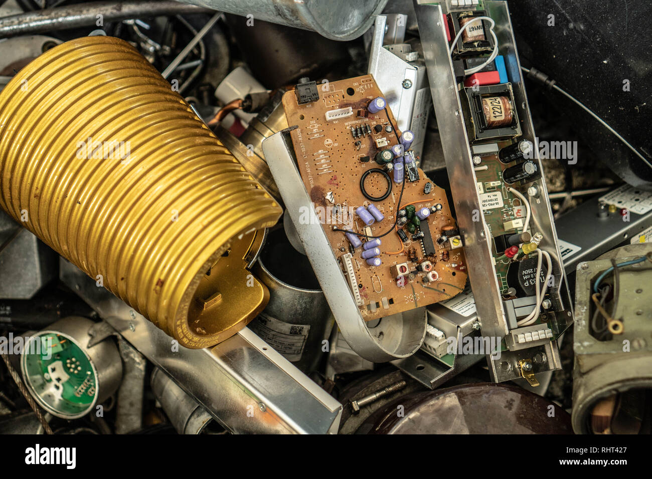 electronic waste in a container Stock Photo Alamy