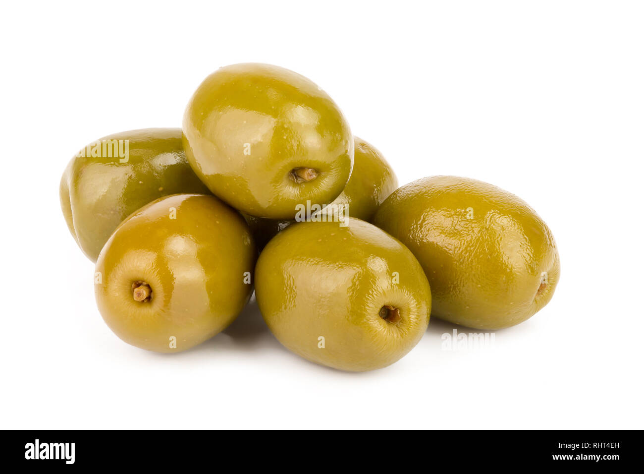 Green olives isolated on a white background Stock Photo - Alamy