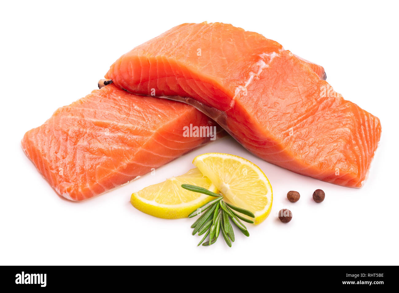 fillet of red fish salmon with lemon and rosemary isolated on white background Stock Photo