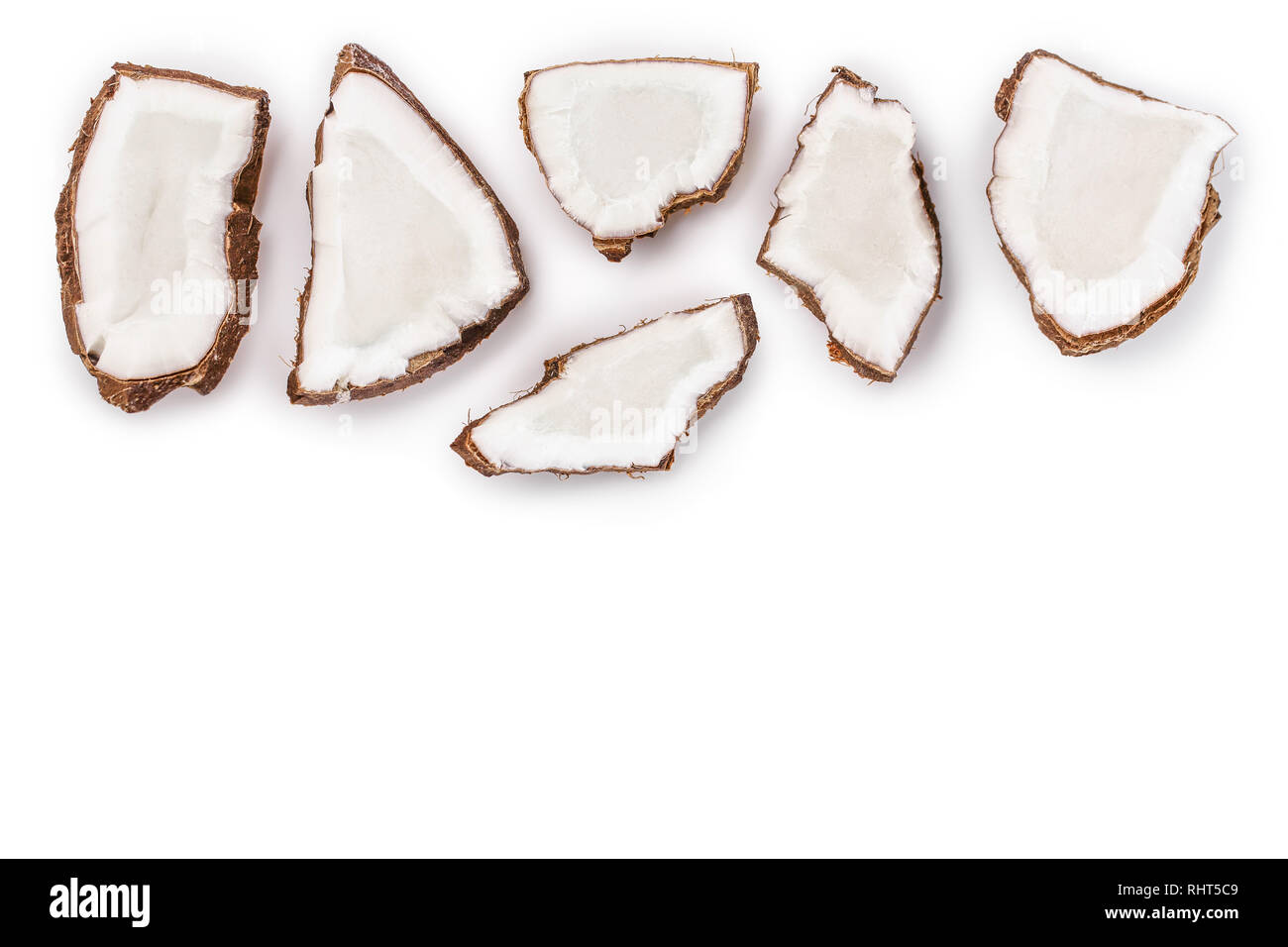 piece of coconut isolated on white background with copy space for your text. Top view. Flat lay Stock Photo