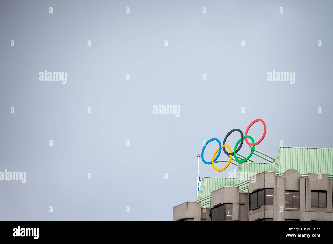 MONTREAL, CANADA - NOVEMBER 7, 2018: Olympic symbol (also known as Olympic Rings) seen on the Montreal olympic Committee building. Montreal became an  Stock Photo