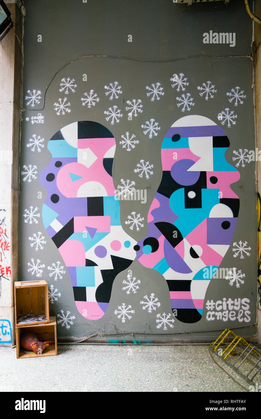 Street art by Cacao Rocks showing #CitysAngels Stock Photo - Alamy