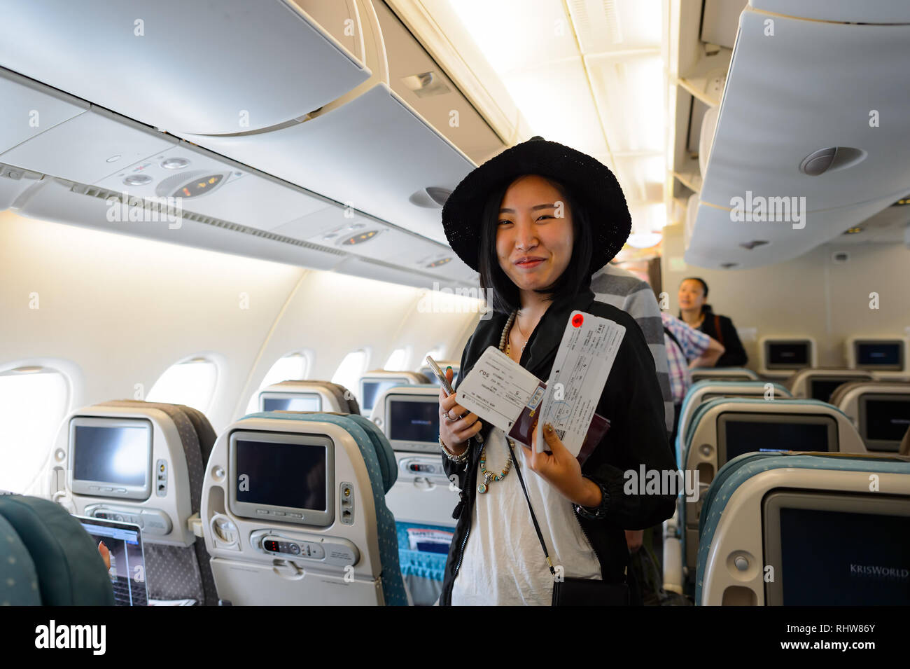 HONG KONG- NOVEMBER 03, 2015: passinger in Singapore Airlines Airbus A380. Singapore Airlines Limited is the flag carrier of Singapore which operates  Stock Photo