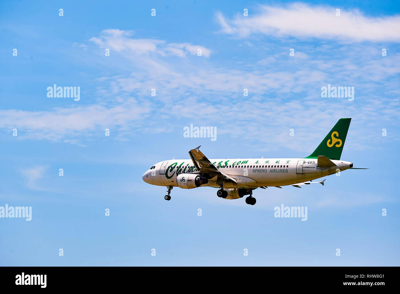 HONG KONG - JUNE 04, 2015: Spring Airlines aircraft landing at Hong ...