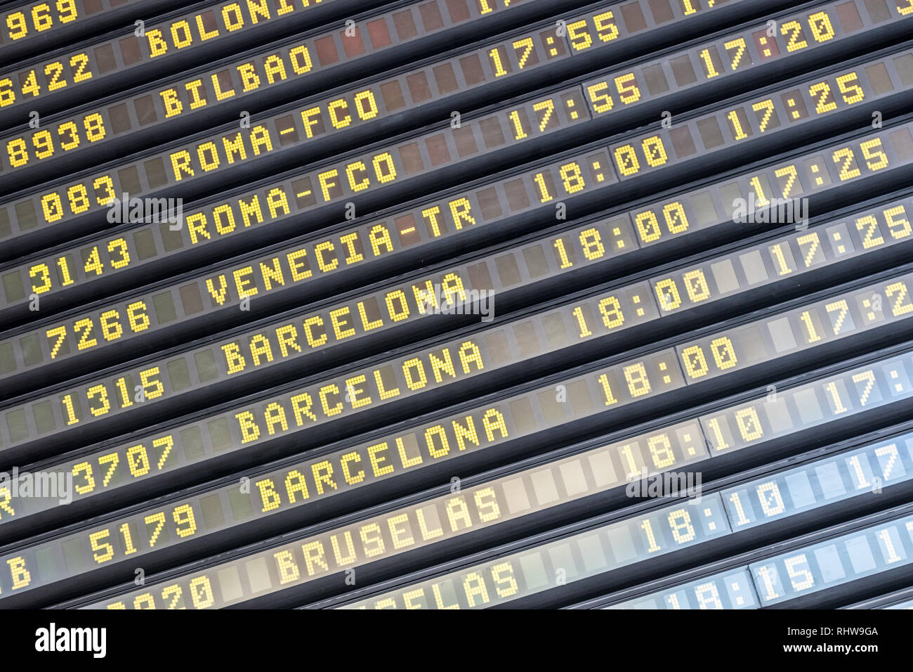 Flight information board at spanish airport terminal Stock Photo