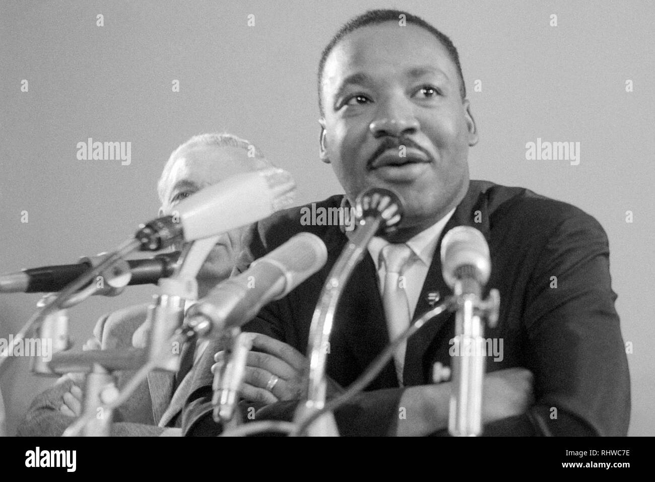 Martin Luther King, Jr. speaking during a press conference at Schiphol Airport in Amsterdam, Holland on August 15, 1964. Stock Photo