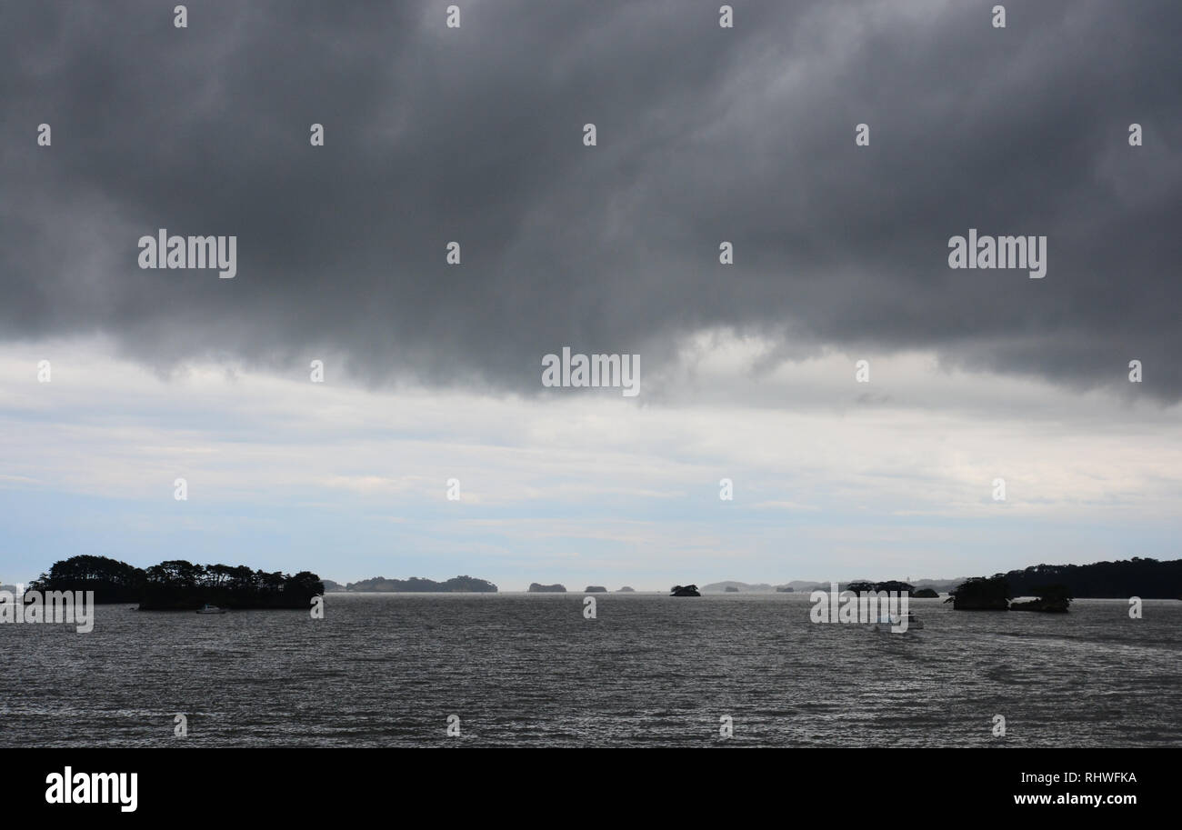 Rain clouds above the sea Stock Photo - Alamy