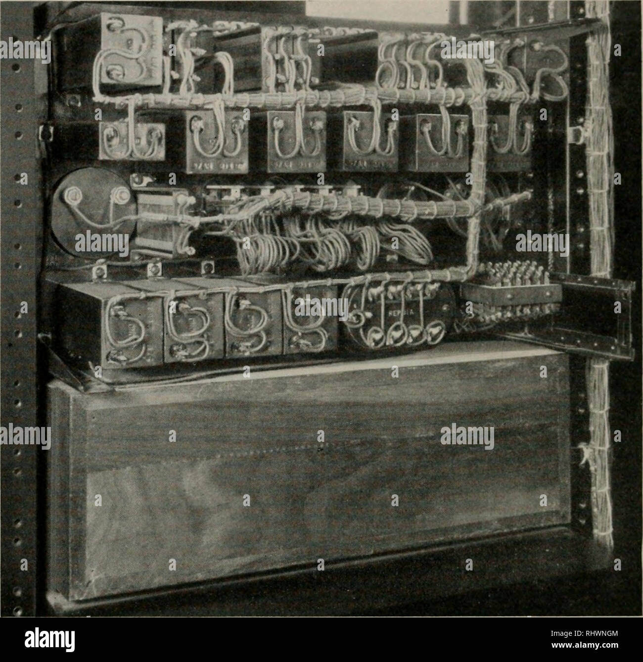 . The Bell System technical journal. Telecommunication; Electric engineering; Communication; Electronics; Science; Technology. 348 BELL SYSTEM TECHNICAL JOURNAL Assuming that the bridge has been properly calibrated from theo- retical considerations of the constants of the measuring circuit, there are two possible sources of error in the results obtained. These errors are due to the time of operation of the two switching relays W and X. In the case of relay W an error will be caused if its two sets of contacts do not close simultaneously. In the case of relay X the source of. Fig. 4 error is du Stock Photo