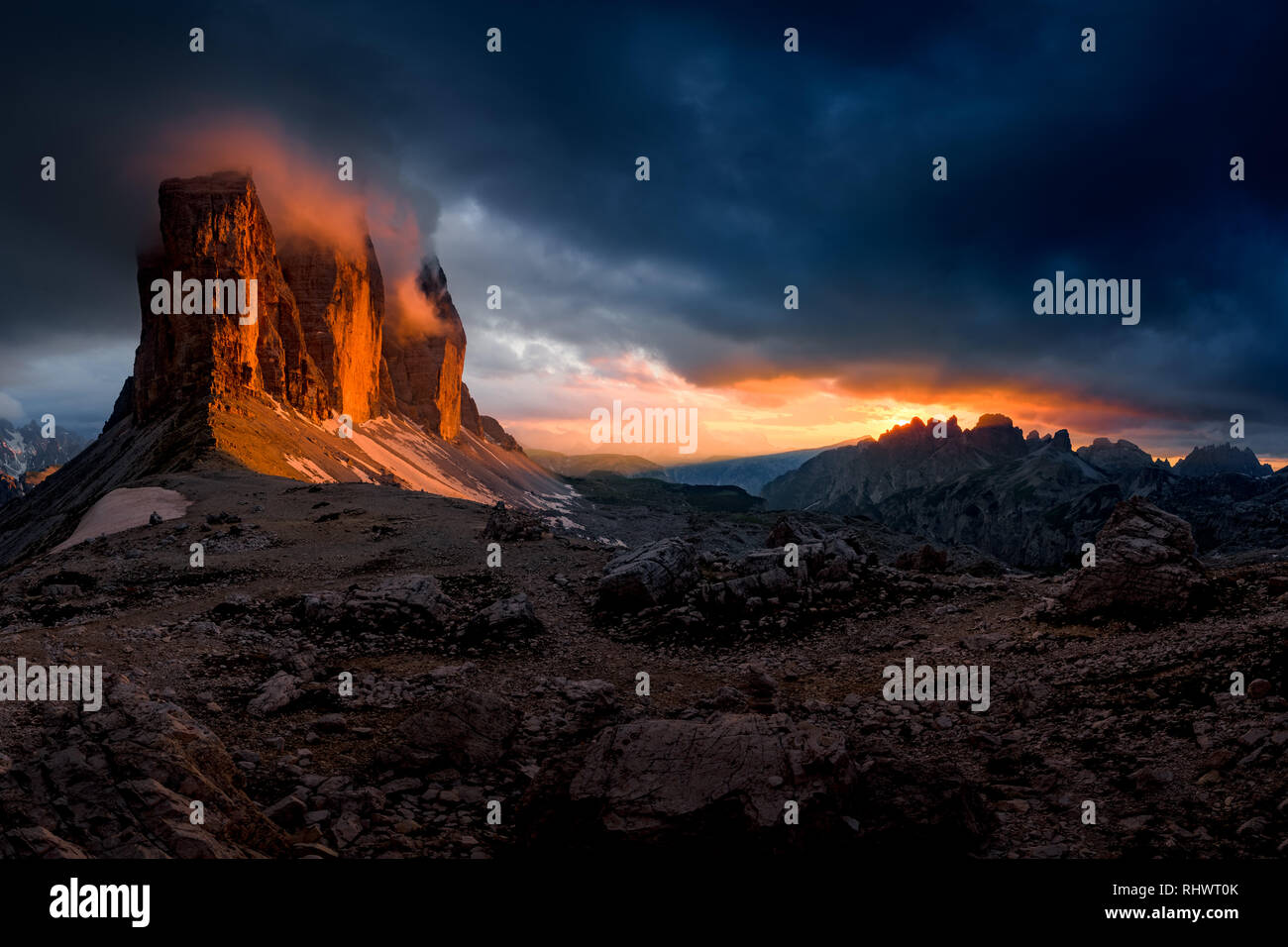 Tre Cime at sunset. one of the most outstanding sunsets i ever got to witness. we climbed Forcella Lavaredo to see the sunset and the enlightening the Stock Photo