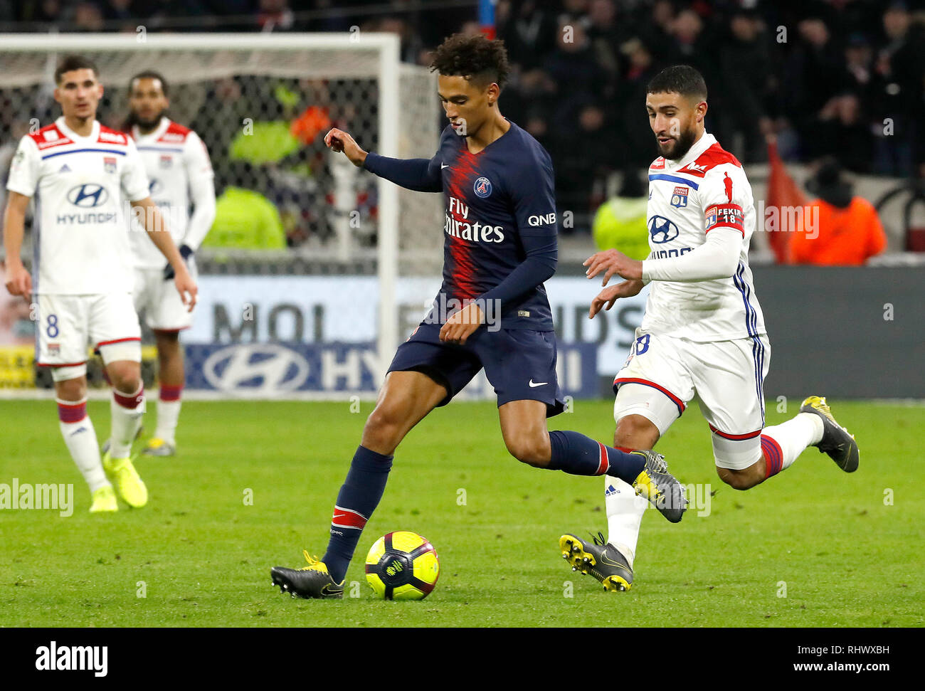 Lyon, France. 3rd Feb, 2019. Thilo Kehrer of Paris Saint-Germain (2nd R) vies with Nabil Fekir of Lyon during the match of French Ligue 1 2018-19 season 23rd round match between Lyon and Paris Saint-Germain in Lyon, France, Feb. 3, 2019. Lyon won 2-1. Credit: Franck Pinaro/Xinhua/Alamy Live News Stock Photo