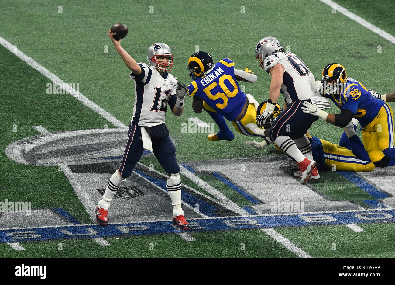 Atlanta. 3rd Feb, 2019. New England Patriots' Tom Brady (1st L) hands off the ball during the NFL Super Bowl LIII football game between New England Patriots and Los Angeles Rams in Atlanta, the United States, Feb. 3, 2014. New England Patriots won 13-3. Credit: Xinhua/Alamy Live News Stock Photo