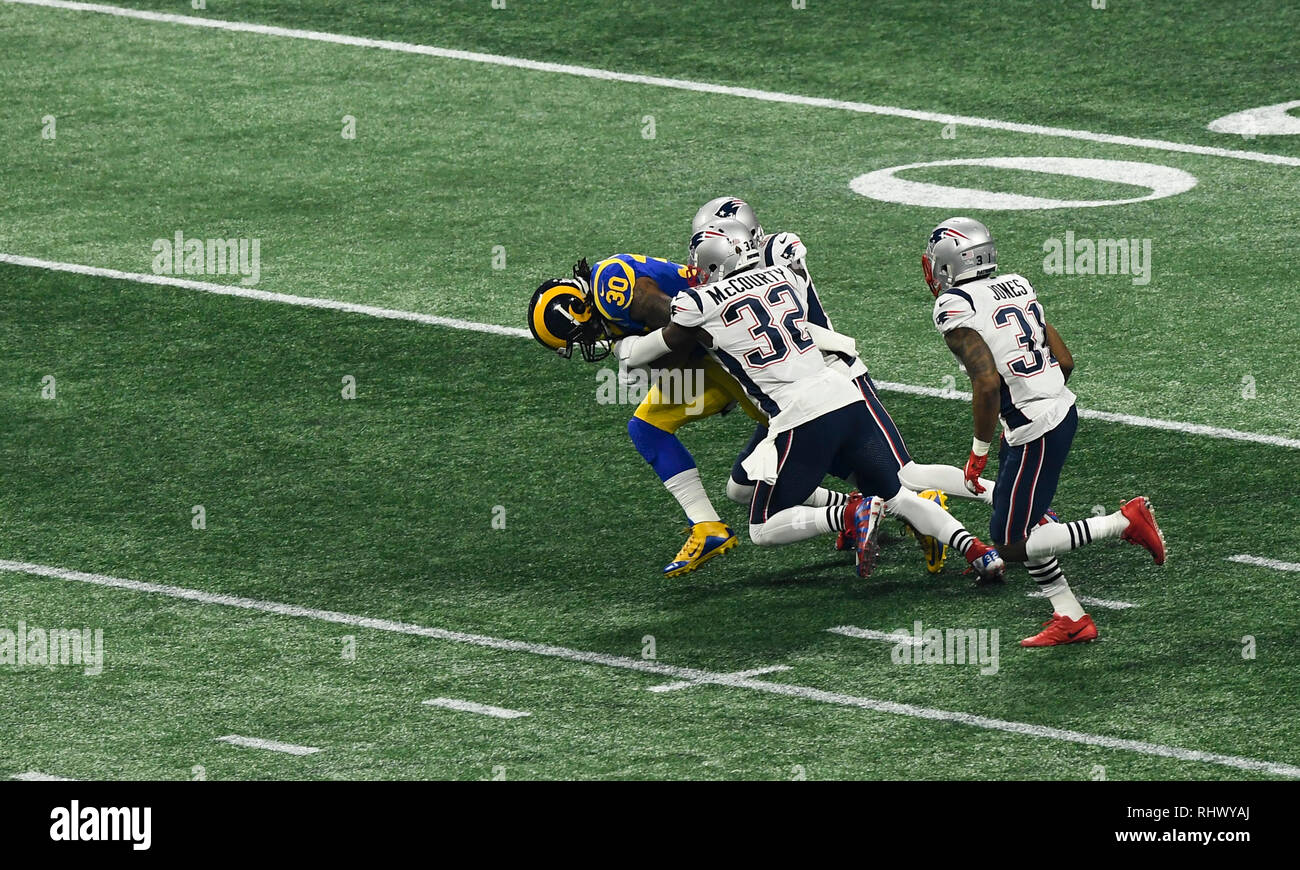 Atlanta. 3rd Feb, 2019. Los Angeles Rams' Todd Gurley (1st L) is tackled during the NFL Super Bowl LIII football game between New England Patriots and Los Angeles Rams in Atlanta, the United States, Feb. 3, 2014. New England Patriots won 13-3. Credit: Xinhua/Alamy Live News Stock Photo