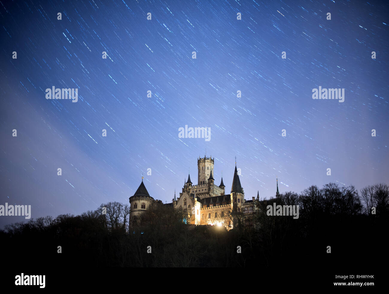 04 February 2019, Lower Saxony, Pattensen: The starry sky above Marienburg Castle in the Hanover region shines brightly (long exposure of six minutes). Ernst August von Hannover junior wants to sell the country his castle for one euro, because a renovation would exceed his financial possibilities. The sale already seemed to be a done deal, but after family disputes among the Guelphs, it is now on ice for the time being. Photo: Julian Stratenschulte/dpa Stock Photo