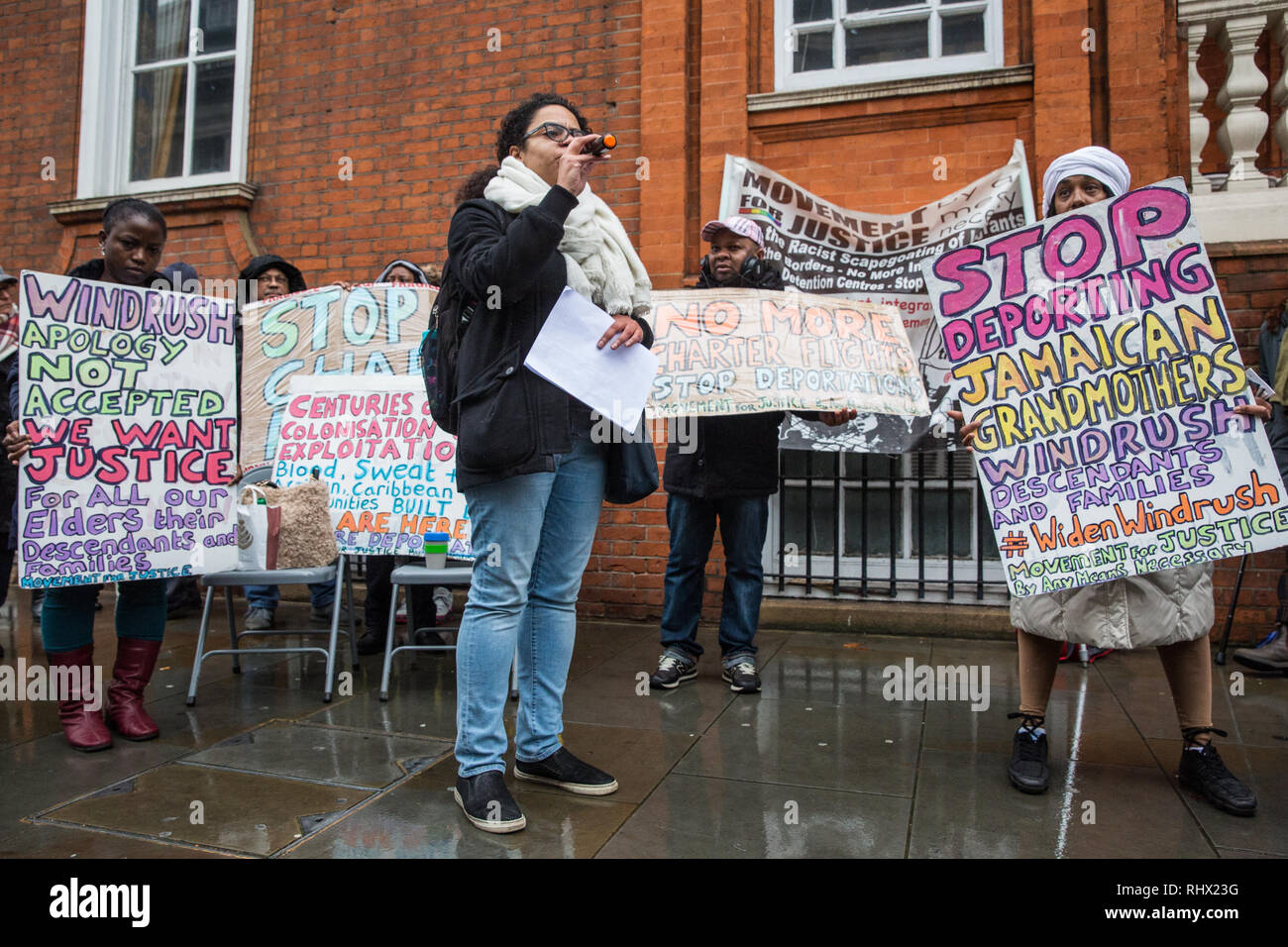 London, UK. 4th February, 2019. Antonia Bright of Movement for Justice addresses a protest outside the Jamaican High Commission against plans by the Home Office and Jamaican government to recommence mass deportation charter flights on 6th February. The enforced removals are reported to include people who came to the UK as children and parents with British children and the deportation flight would be the first since March 2017 and the Windrush scandal. Credit: Mark Kerrison/Alamy Live News Stock Photo