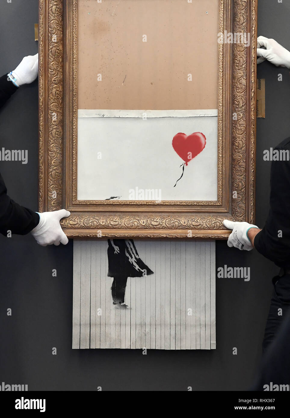 Baden Baden, Germany. 04th Feb, 2019. The shredded Banksy painting "Love is  in the Bin" is hung in the Frieder Burda Museum. The work will be shown  there from 05.02.2019 to 03.03.2019.