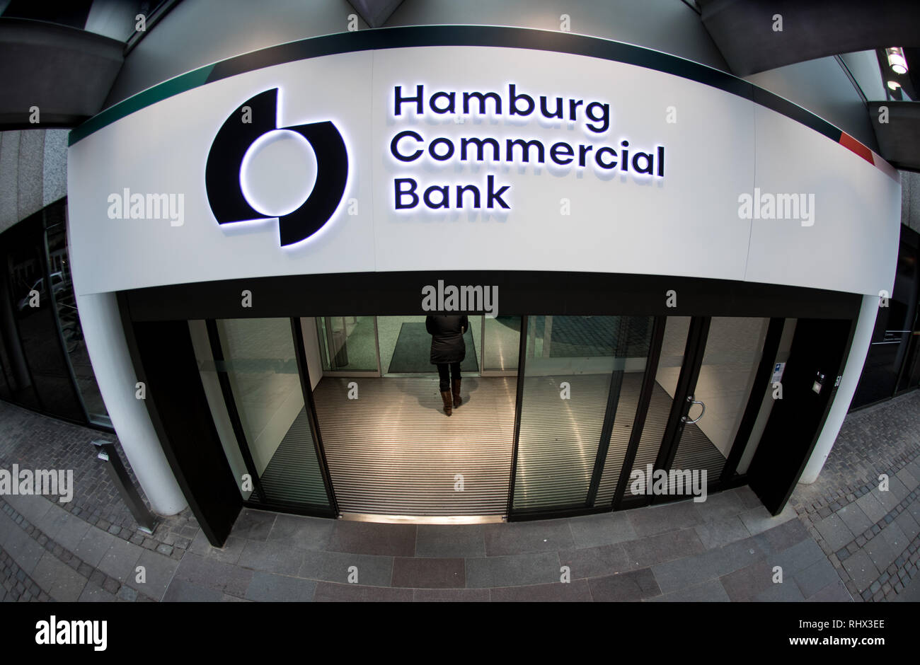 04 February 2019, Hamburg: A woman walks through the main entrance to ...