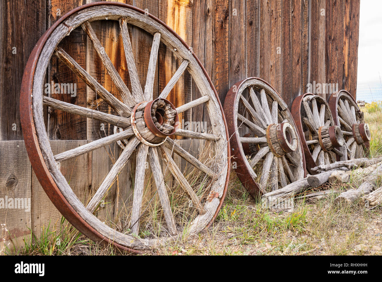 Old wagon wheels in Elizabethtown, New Mexico, USA. A former mining