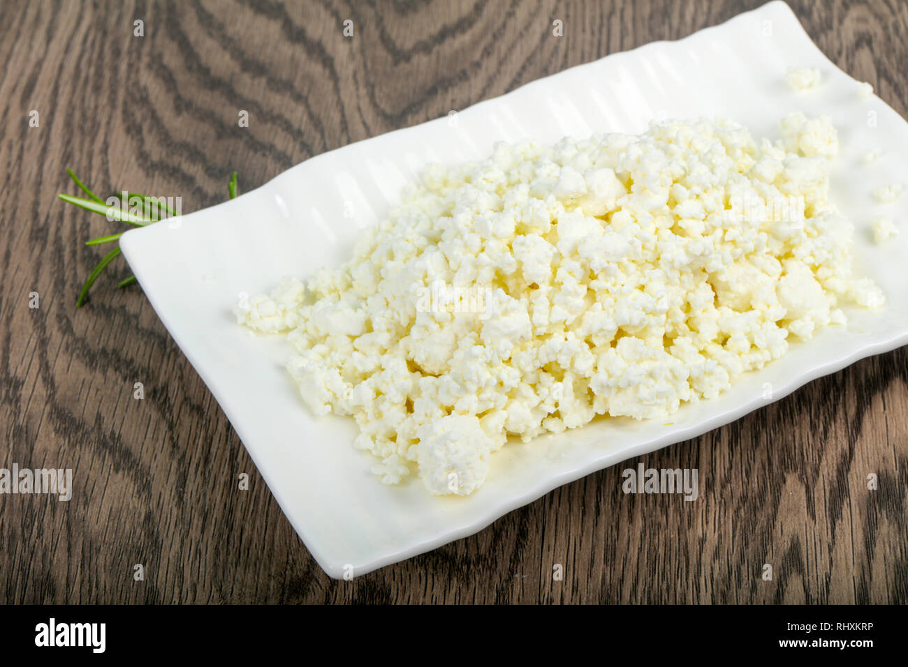 Cottage Cheese In The Bowl Over Wooden Stock Photo Alamy cottage-cheese-in-the-bowl-over-wooden-stock-photo-alamy