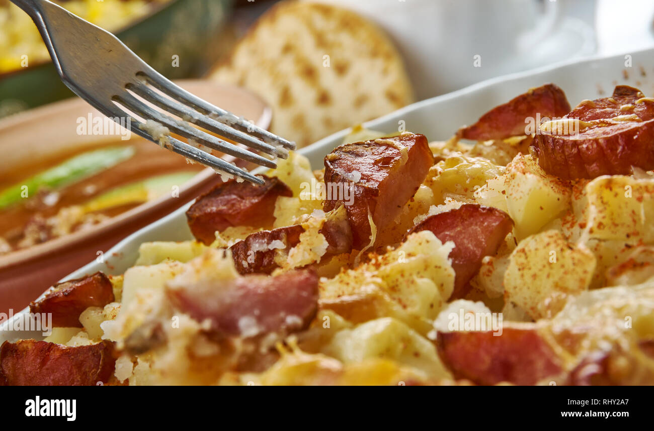 Ranch Potatoes, combine ranch dressing, taco seasoning, and half the shredded cheddar cheese