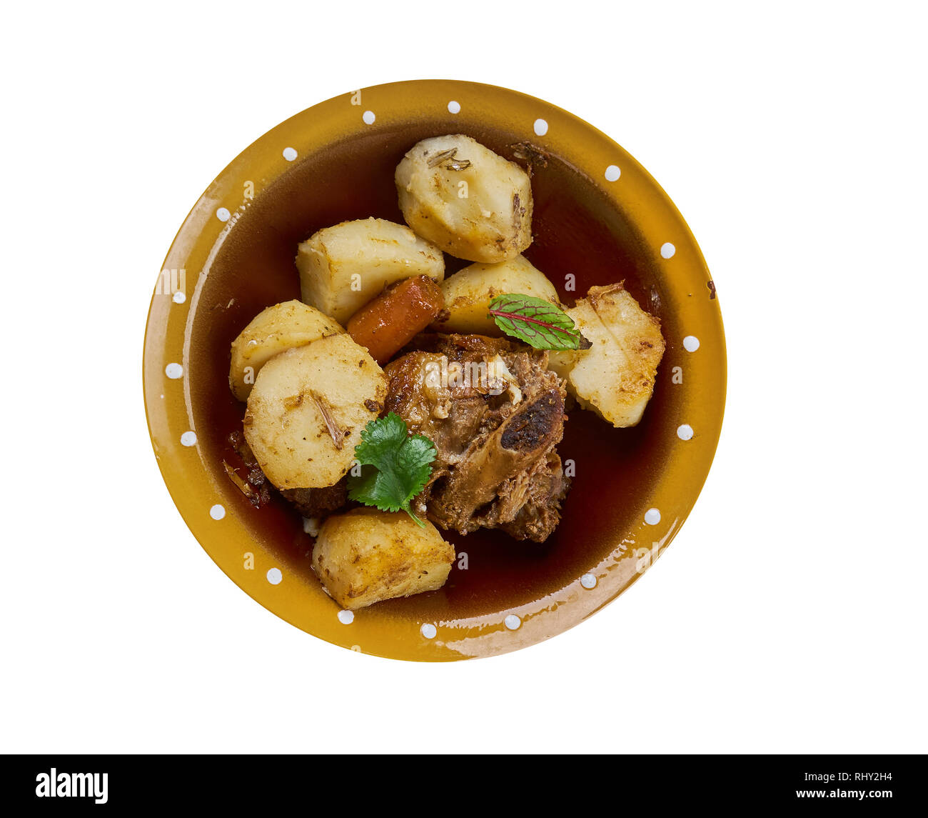 Greek lamb kleftiko with potatoes, oregano and lemon Stock Photo Alamy