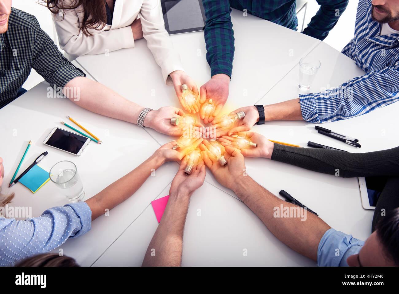 Teamwork and brainstorming concept with businessmen that share an idea ...