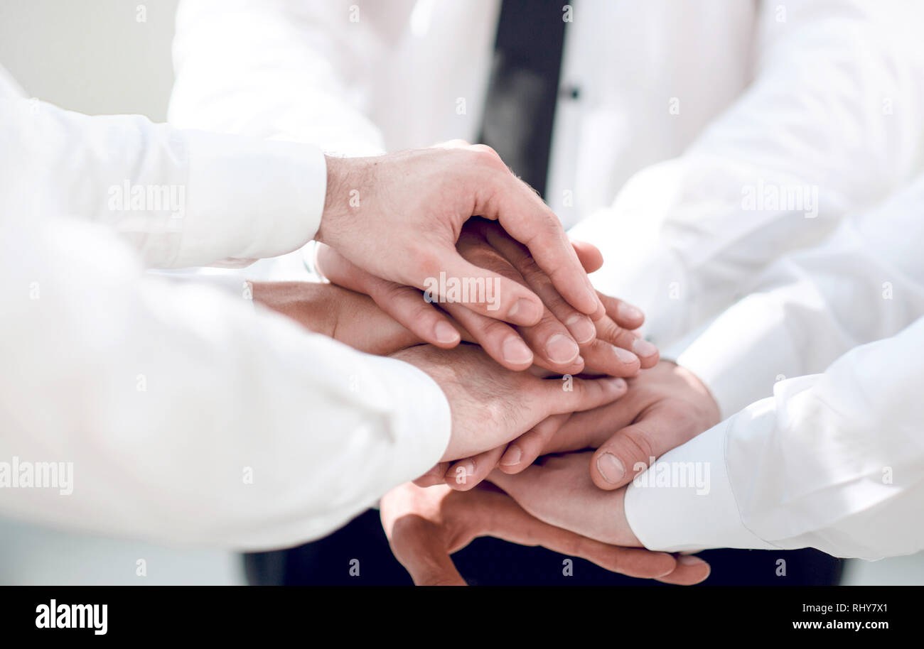 close up. business people with a stack of hands Stock Photo - Alamy