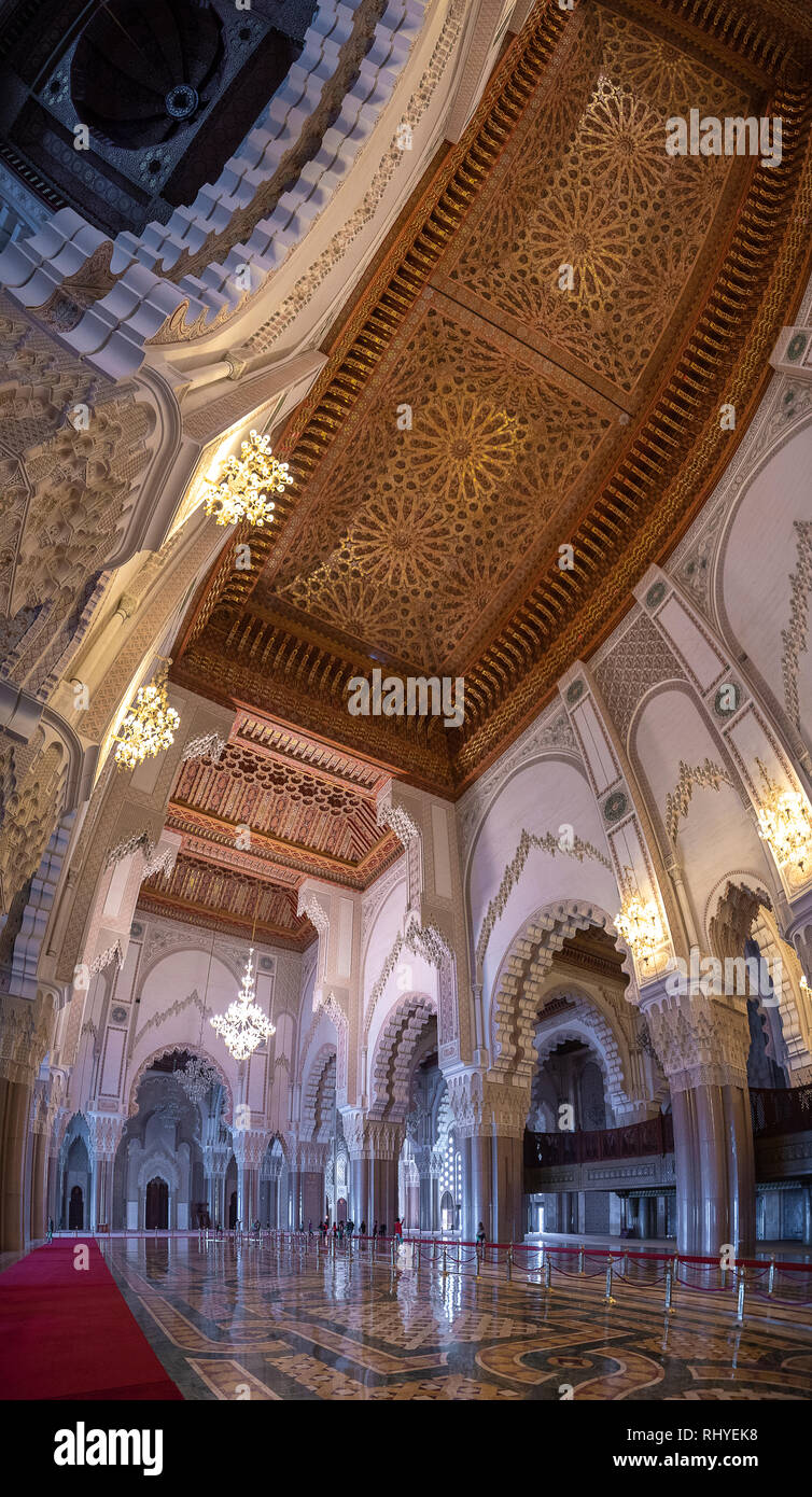 Inside Hassan II Mosque interior corridor with columns. Arabic arches
