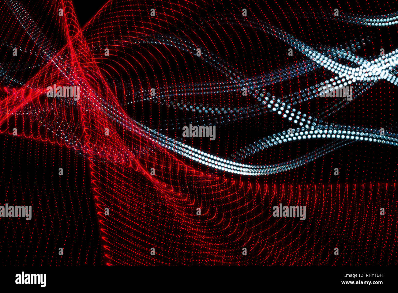 Colorful and abstract lines curved shapes on black background. Abstract light painting. Stock Photo