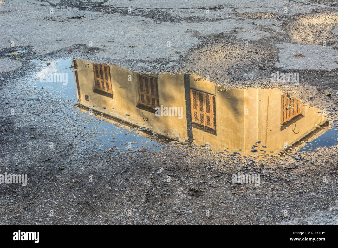 Reflections In A Rain Puddle High Resolution Stock Photography and ...