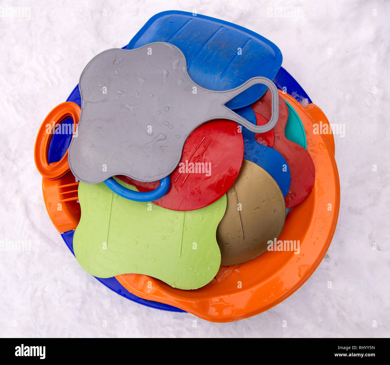 Colorful sleds for kids for sledding Stock Photo Alamy