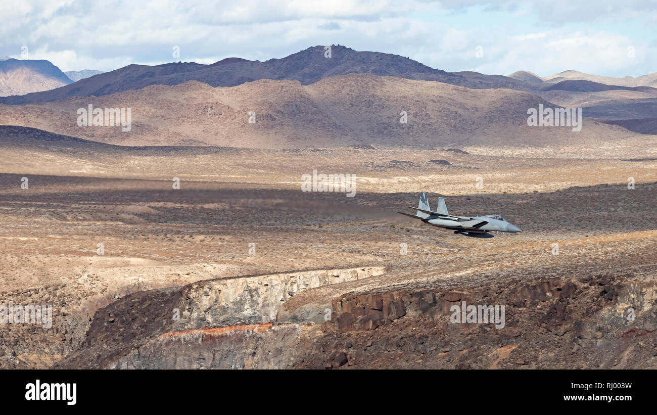 Jet fighter flying at Star Wars Canyon training area in the California desert Stock Photo