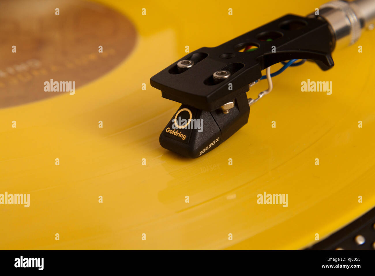 Coloured vinyl record playing on a turntable  Picture by Gary Doak/Alamy Stock Photo