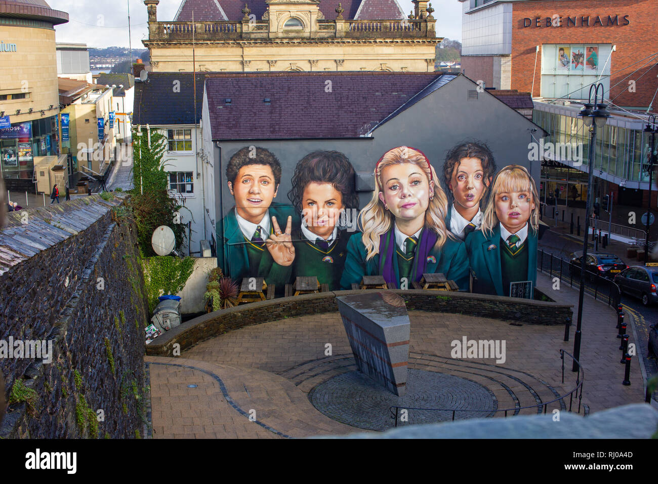 Derry, Northern Ireland - January 29 2019: Mural on a pub depicting the main characters in Channel 4's tv show 'Derry Girls' Stock Photo