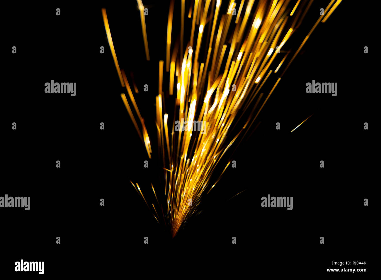 Sparks while cutting steel in the factory Stock Photo