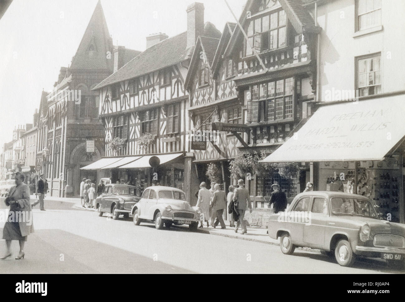 Antique c1950 photograph, The Garrick Inn and Harvard House on High Street in Stratford-upon-Avon, England, UK. SOURCE: ORIGINAL VINTAGE PHOTOGRAPH Stock Photo