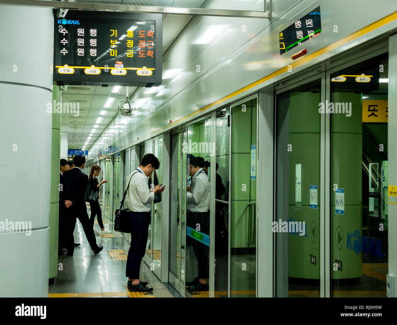 Seoul, South Korea - June 12, 2017: People waiting for the train on the Seoul subway platform. Stock Photo