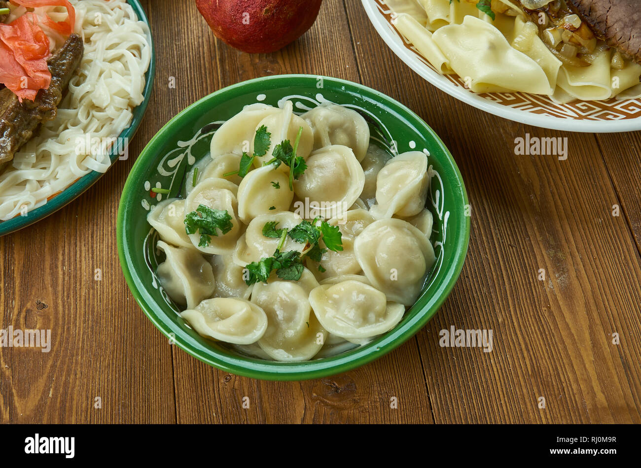 Chuchpara, kind of dumpling, which is popular in Central Asia, Kyrgyz  cuisine, Traditional assorted dishes, Top view. Stock Photo