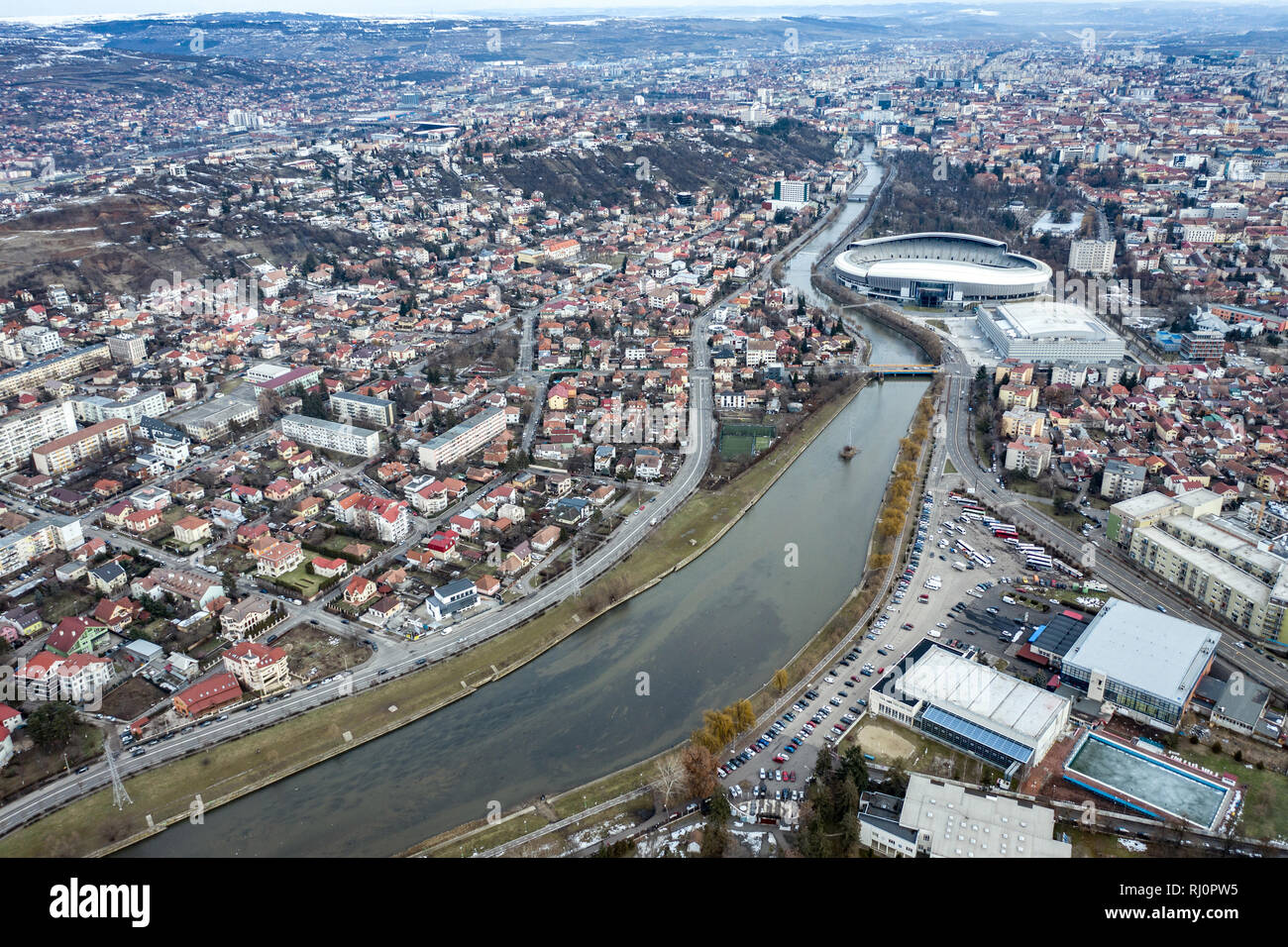 Aerial above view of river crossing the city. Drone shot of Cluj Napoca,  Romania Stock Photo - Alamy