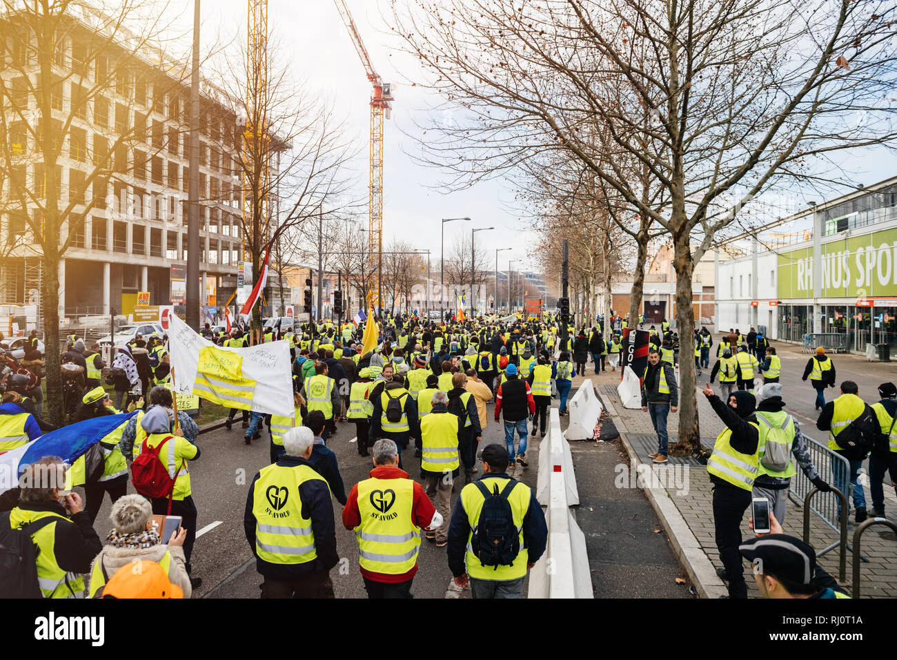 STRASBOURG, FRANCE - FEB 02, 2018: Rear view of adult woman with Louis  Vuitton backpack during protest of Gilets Jaunes Yellow Vest manifestation  anti-government demonstrations on Boulevard de Dresde Stock Photo - Alamy
