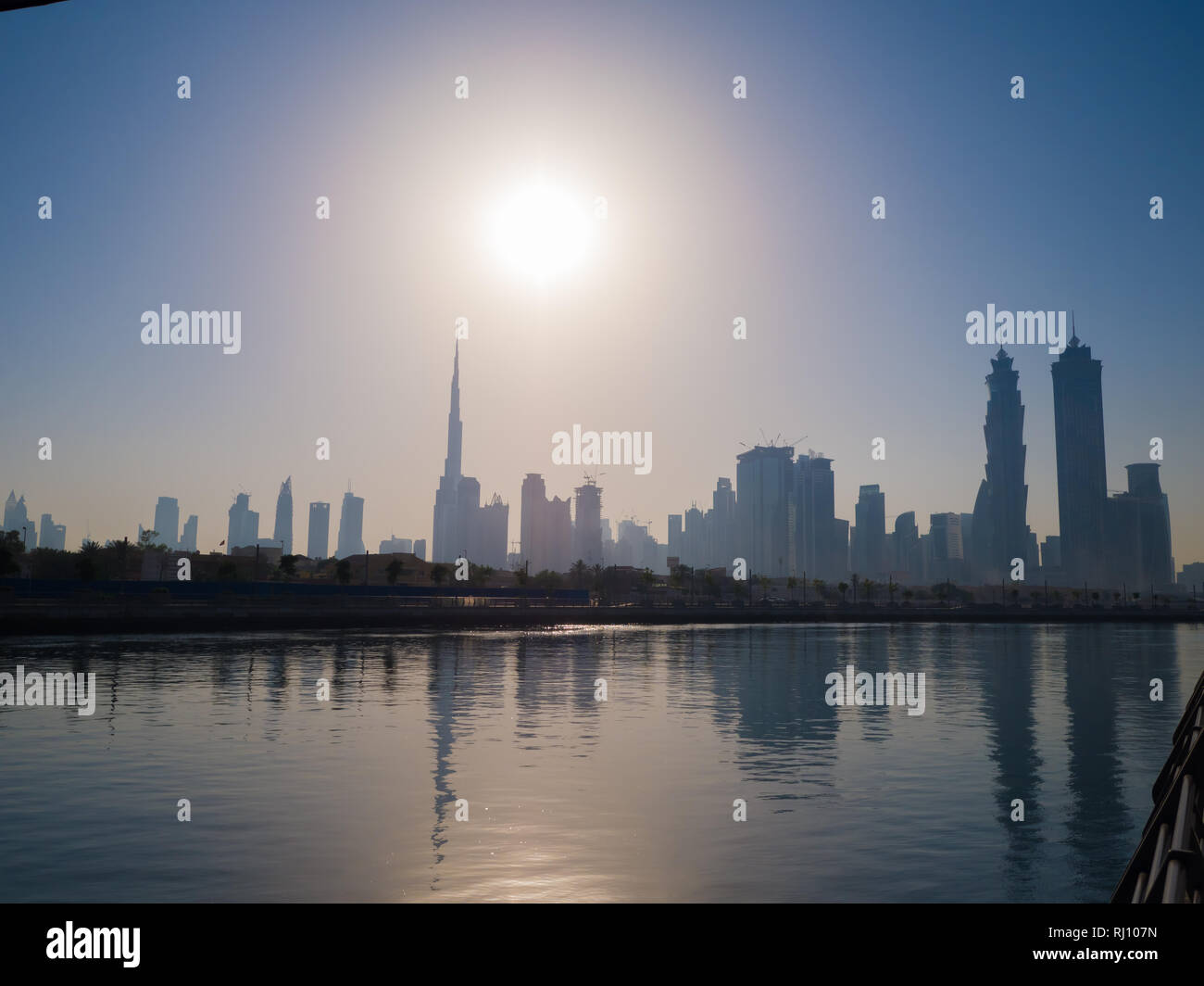 Panorama of the city of Dubai early in the morning at sunrise with a bridge over the city