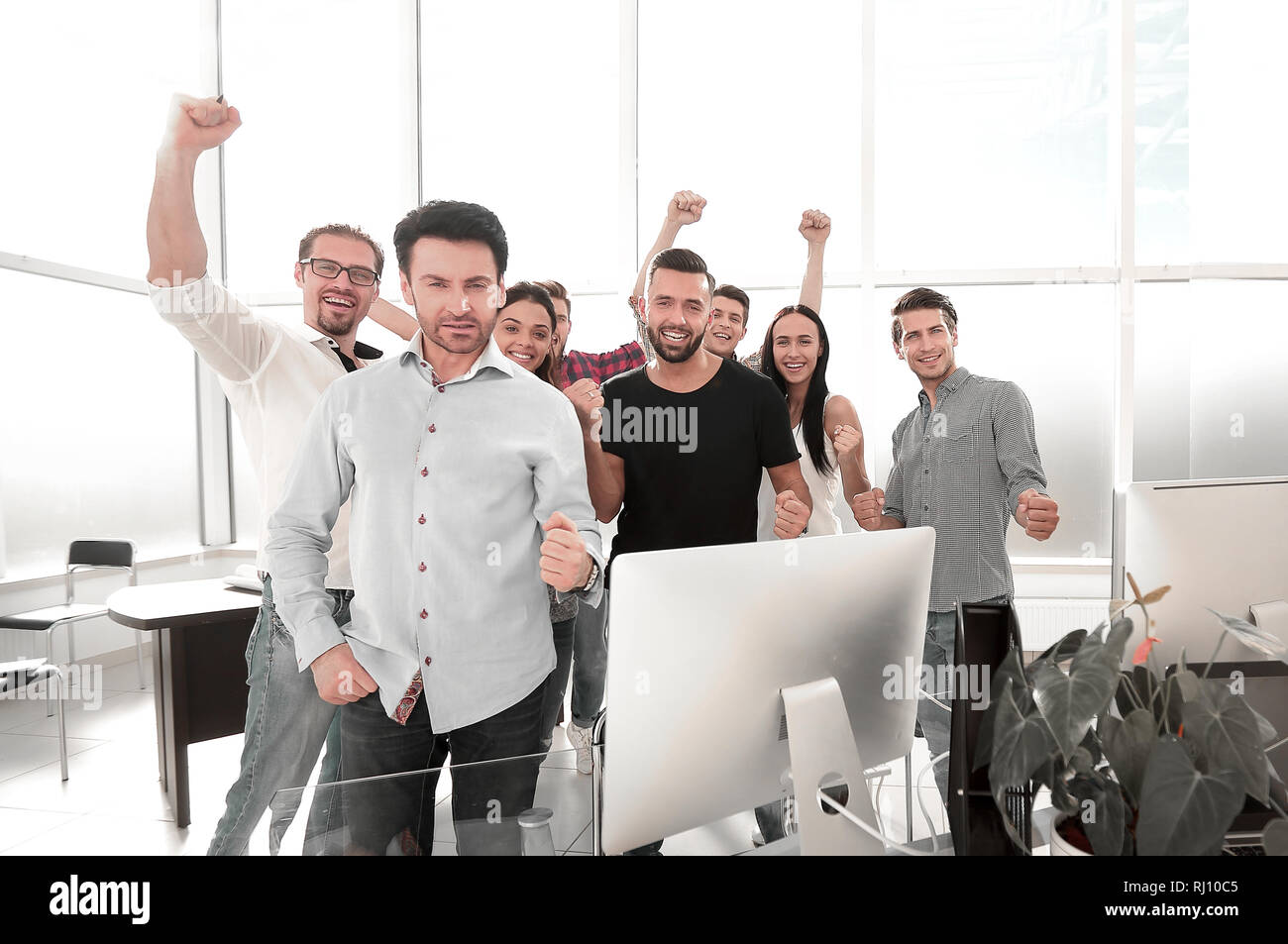 professional business team standing in a modern office Stock Photo - Alamy