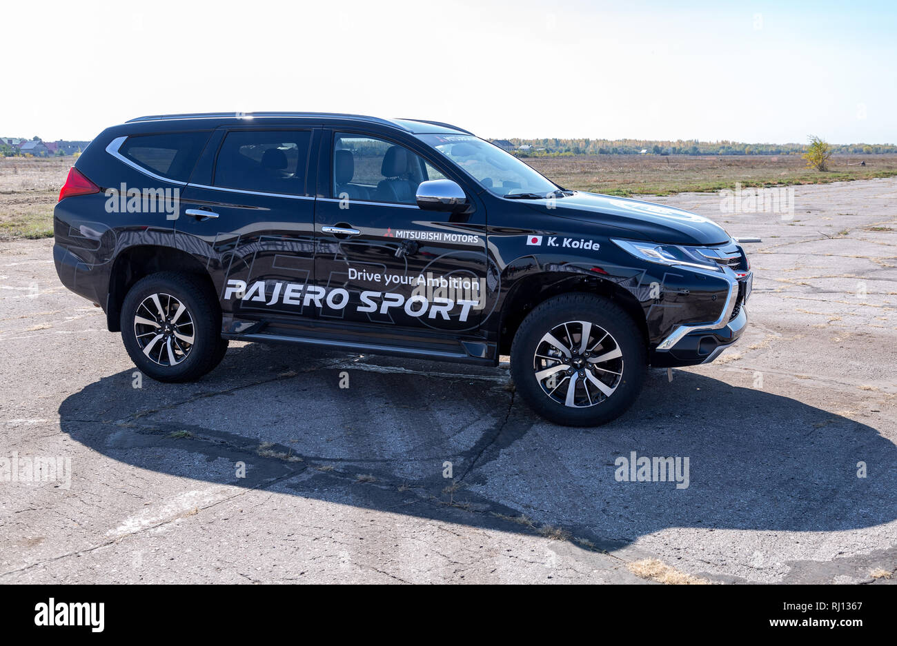 Samara, Russia - September 23, 2018: Off-road car Mitsubishi Pajero Sport 4x4 parked on the field for test driving Stock Photo