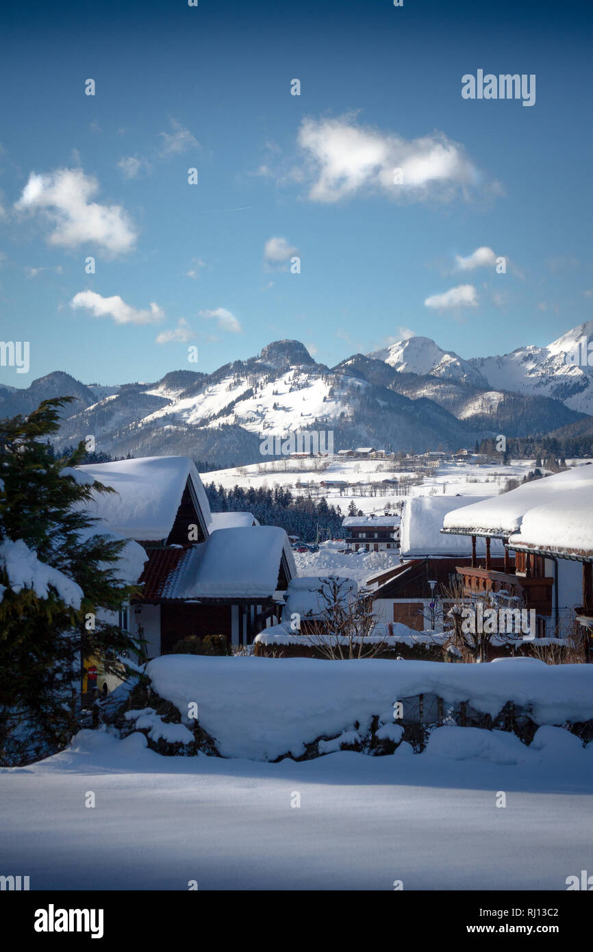 landscape with snowy winter houses, Reit im Winkl, bavaria, alps Stock Photo