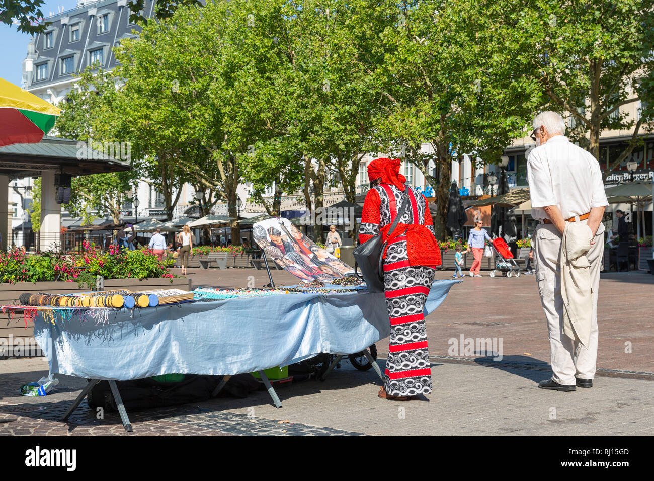 Woman street vendor at Place Guillaume Luxembourg City Stock Photo