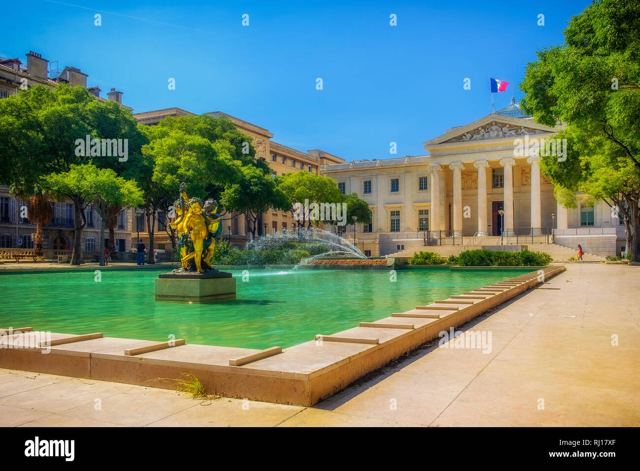 Marseilles, France, courthouse building in front of a basin with a