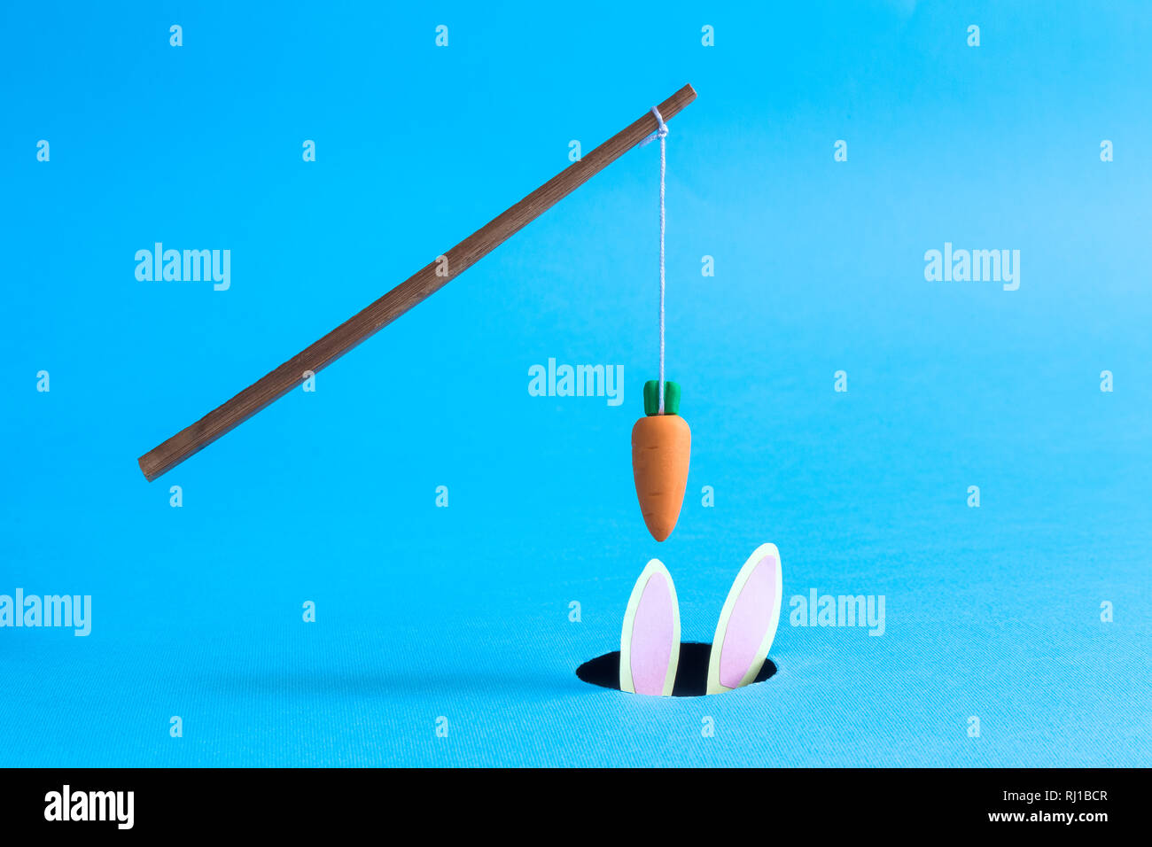 Carrot stick incentive hi-res stock photography and images - Alamy