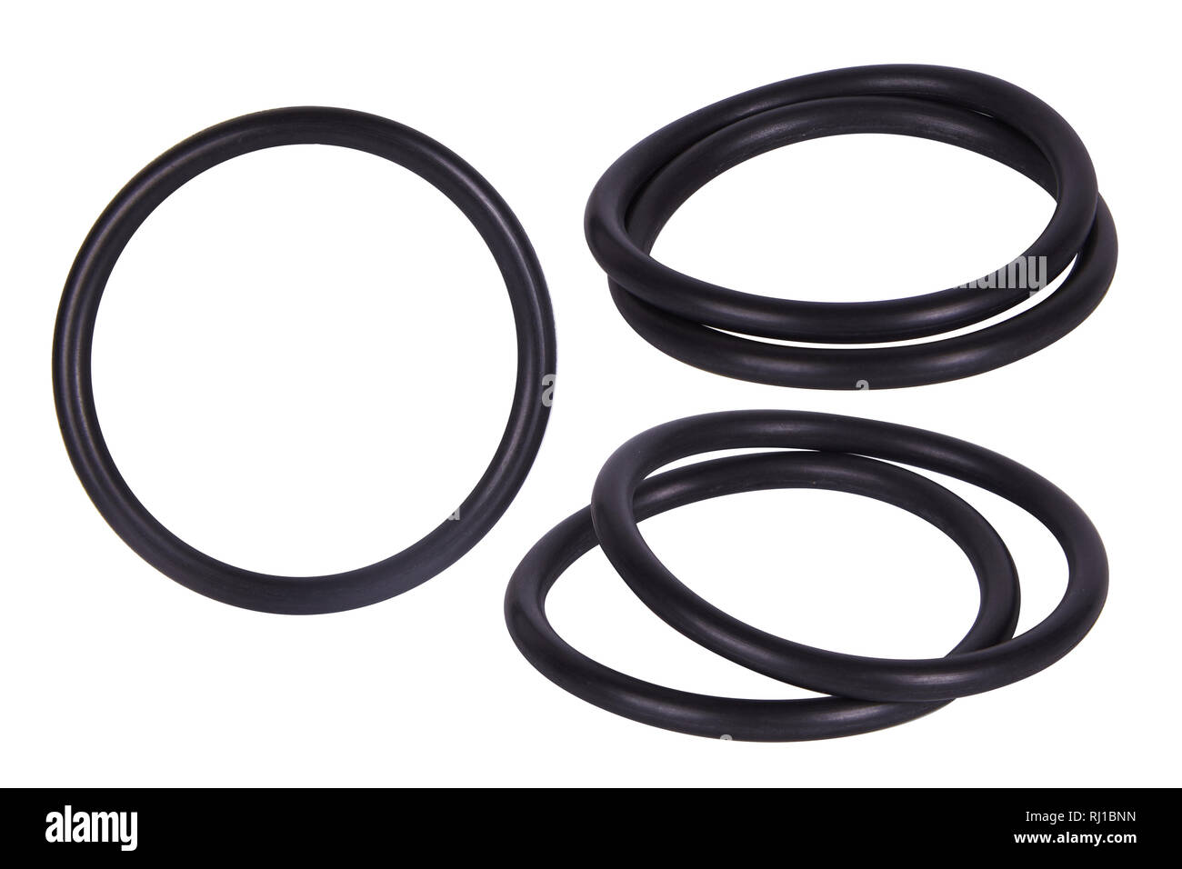 Set of black gaskets isolated. Oil seals for hydraulic cylinders for