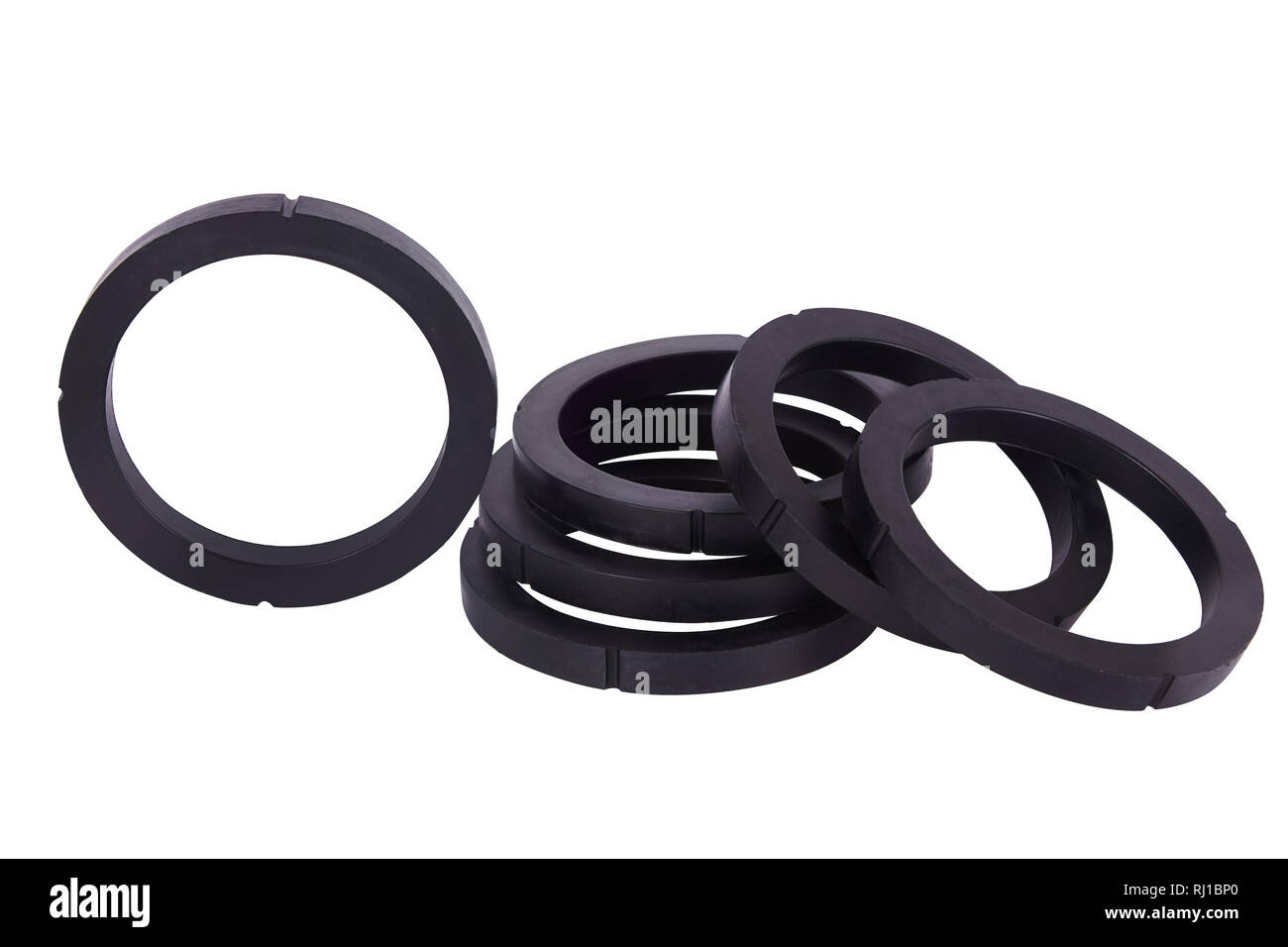 Set of black gaskets isolated. Oil seals for hydraulic cylinders for