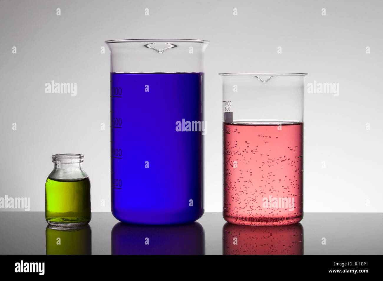 Liquid in laboratory bottles. Scientific biochemical laboratory ...