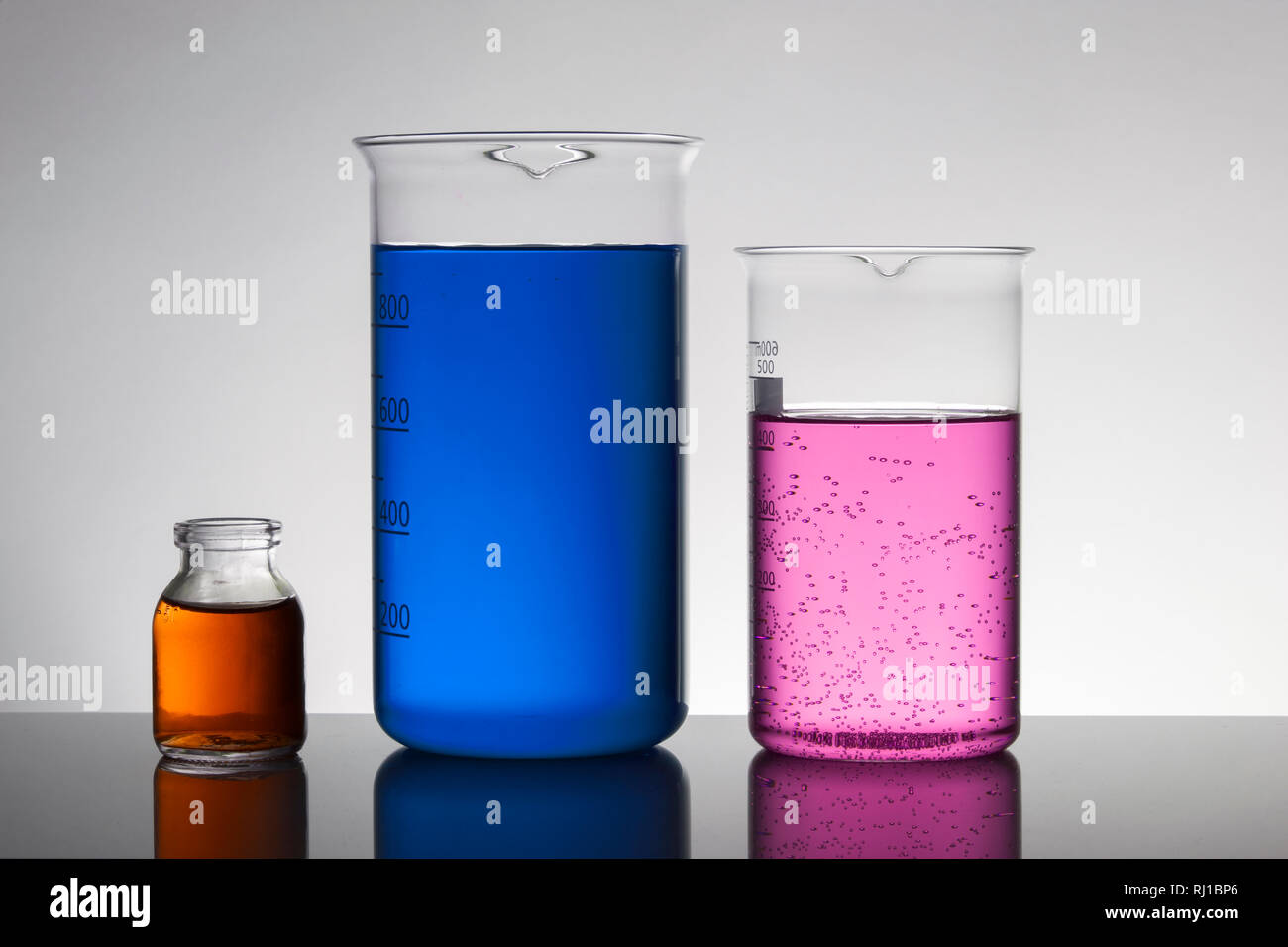 Liquid in laboratory bottles. Scientific biochemical laboratory ...